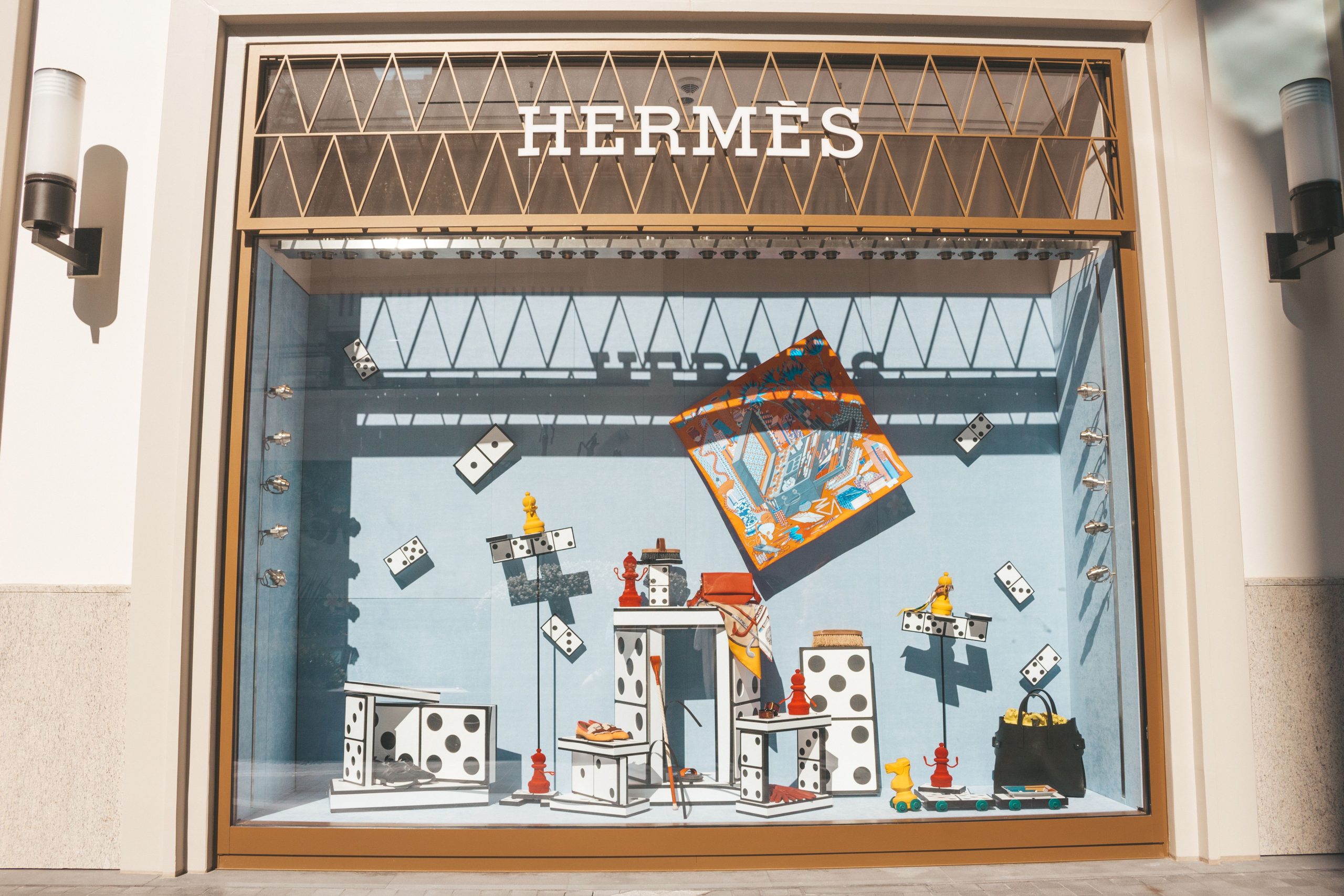 Hermes luxury store window display with distinctive decor and premium products